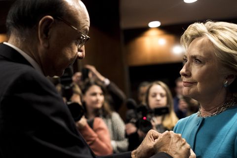 Backstage for a rally, Democratic Nominee for President of the United States former Secretary of State Hillary Clinton speaks to Khizr Khan, Gold Star Father, before a campaign event in Manchester, New Hampshire on Sunday November 6, 2016. (Photo by Melina Mara/The Washington Post via Getty Images)
