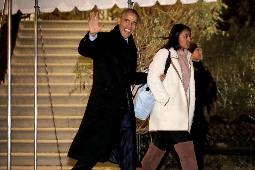 Sasha Obama wears one of the season's trendiest unisex bags