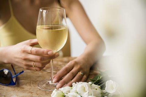 Finger, Stemware, Glass, Wine glass, Barware, Drinkware, Drink, Hand, Petal, Bouquet, 