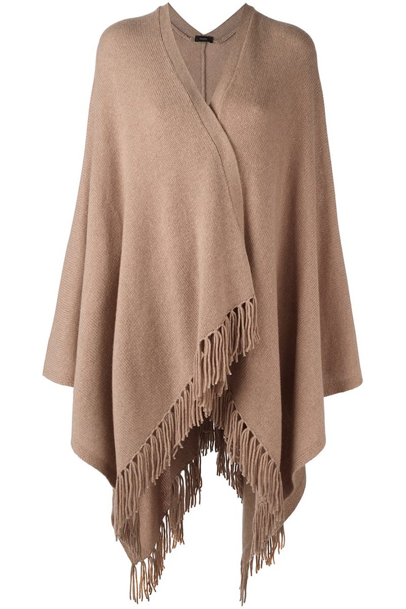 <p><em data-redactor-tag="em" data-verified="redactor">Joseph poncho, $477, <a href="https://www.farfetch.com/shopping/women/joseph-fringed-knit-poncho-item-11487151.aspx?storeid=9214&amp;from=listing&amp;rnkdmnly=1&amp;ffref=lp_pic_22_4_" target="_blank" data-tracking-id="recirc-text-link">farfetch.com</a>.</em></p>