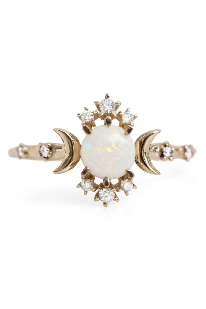 Engagement ring with opals