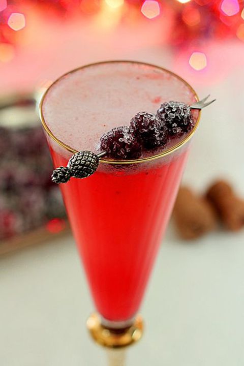 <p>Pop, fizz and clink the day away with a cranberry champagne cocktail.&nbsp;</p><p><em data-redactor-tag="em" data-verified="redactor"><a href="http://www.creative-culinary.com/double-platinum-champagne-cocktail/" target="_blank" data-tracking-id="recirc-text-link">Recipe via Creative Culinary</a></em><span class="redactor-invisible-space" data-verified="redactor" data-redactor-tag="span" data-redactor-class="redactor-invisible-space"><em data-redactor-tag="em" data-verified="redactor"><a href="http://www.creative-culinary.com/double-platinum-champagne-cocktail/"></a></em></span></p>