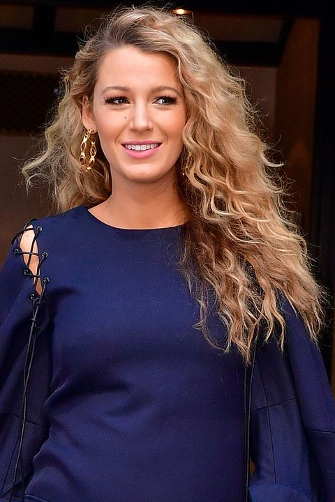 <p>Just when we thought Blake Lively's hair couldn't reach any more levels of perfection, she stepped-put with these springy curls this past summer.&nbsp;</p>