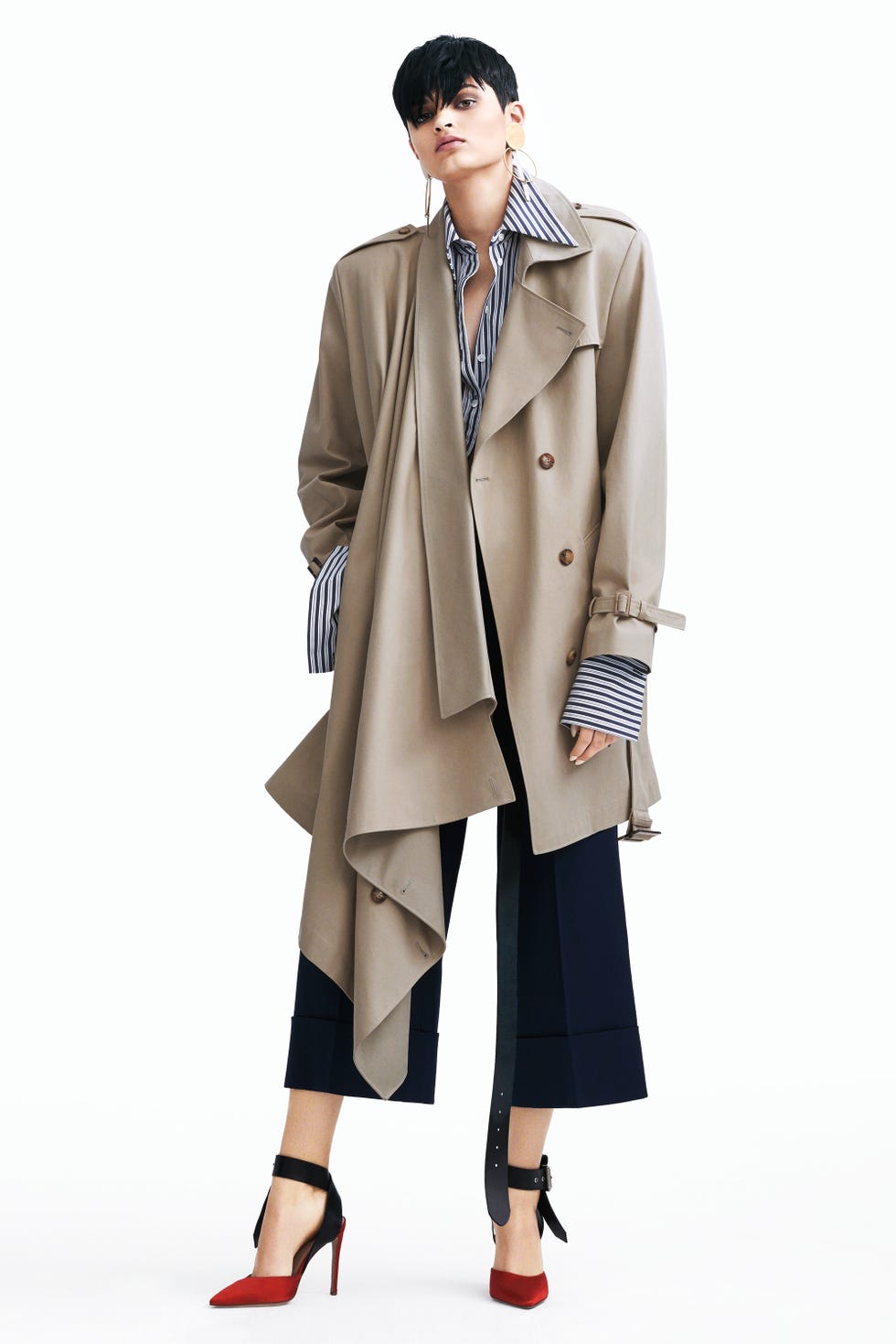 <p>Turn it up in a definitive trench.</p><p><strong data-redactor-tag="strong" data-verified="redactor">Michael Kors Collection</strong>&nbsp;coat, $2,995,&nbsp;shirt, $495, and pants, $895, <a href="http://www.michaelkors.com/" target="_blank" data-tracking-id="recirc-text-link">michaelkors.com</a>; <strong data-redactor-tag="strong" data-verified="redactor">Annie Costello Brown</strong> earrings, $275, <a href="http://anniecostellobrown.com/" target="_blank" data-tracking-id="recirc-text-link">anniecostellobrown.com</a>; <strong data-redactor-tag="strong" data-verified="redactor">Monse</strong> shoes, $890, <a href="https://www.net-a-porter.com/" target="_blank" data-tracking-id="recirc-text-link">net-a-porter.com</a>.&nbsp;<br></p>