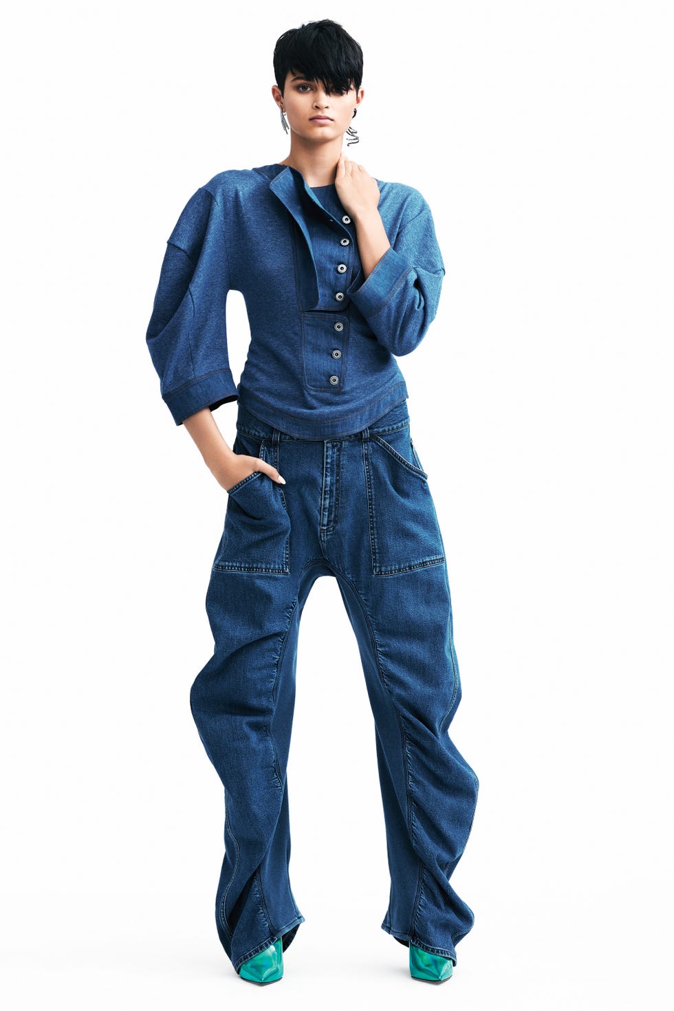 <p>If prints are too overwhelming, try doubling down on denim. </p><p><strong data-redactor-tag="strong" data-verified="redactor">Stella McCartney</strong> top, $985, jeans, and shoes, prices upon request, 212-255-155; <strong data-redactor-tag="strong" data-verified="redactor">Lynn Ban</strong> earrings, $5,700-$20,000, <a href="https://www.lynnban.com/" target="_blank" data-tracking-id="recirc-text-link">lynnban.com</a>.</p><p><strong data-redactor-tag="strong" data-verified="redactor">BEAUTY BAZAAR: </strong><a href="http://www.ulta.com/miracle-defrizzing-gel?productId=xlsImpprod14021049" target="_blank" data-tracking-id="recirc-text-link">It's a 10 Miracle Defrizzing Gel</a> tames flyaways and provides hold for chic styles ($17).&nbsp;<span class="redactor-invisible-space"></span><br></p>
