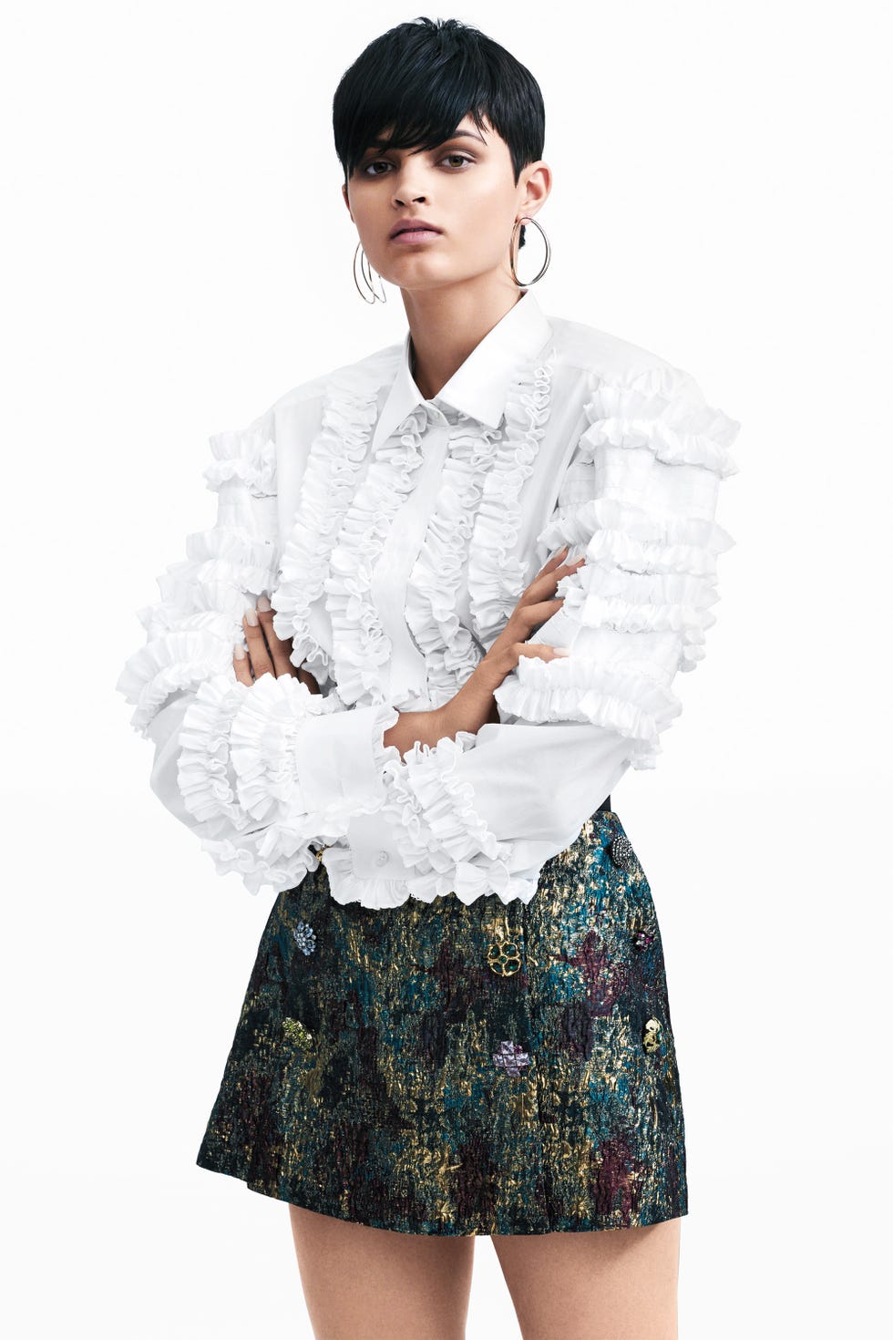 <p>Play with texture in a frilly top and a brocade skirt.&nbsp;</p><p><strong data-redactor-tag="strong" data-verified="redactor">Dolce &amp; Gabbana </strong>shirt, $1,495, and skirt, $2,795<span class="redactor-invisible-space">;&nbsp;</span><strong data-redactor-tag="strong" data-verified="redactor">Delfina Delettrez</strong> earrings, $4,219, <a href="http://www.matchesfashion.com/womens" target="_blank" data-tracking-id="recirc-text-link">matchesfashion.com</a>.</p><p><strong data-redactor-tag="strong" data-verified="redactor">BEAUTY BAZAAR: </strong><a href="http://www.ulta.com/mineral-wear-talc-free-mineral-airbrushing-pressed-bronzer?productId=xlsImpprod5020071&amp;sku=2254315&amp;cmpid=PS_Non!google!Product_Listing_Ads&amp;cagpspn=pla&amp;CATCI=pla-195004782030&amp;CAAGID=17983616910&amp;CAWELAID=1809745648&amp;catargetid=330000200000763352&amp;cadevice=c&amp;gclid=COe14fLNg9ECFQmHswodX0sJgg" target="_blank" data-tracking-id="recirc-text-link">Physicians Formula Mineral Wear Talc-Free Mineral Airbrushing Bronzer SPF 30</a> creates a sheer, sun-kissed glow ($14).&nbsp;<span class="redactor-invisible-space"></span><br></p>