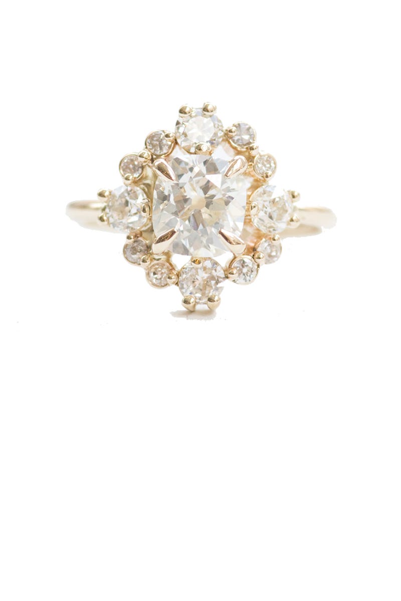 Jewellery, Diamond, Fashion accessory, Body jewelry, Gemstone, Ring, Brooch, Metal, Gold, Engagement ring, 