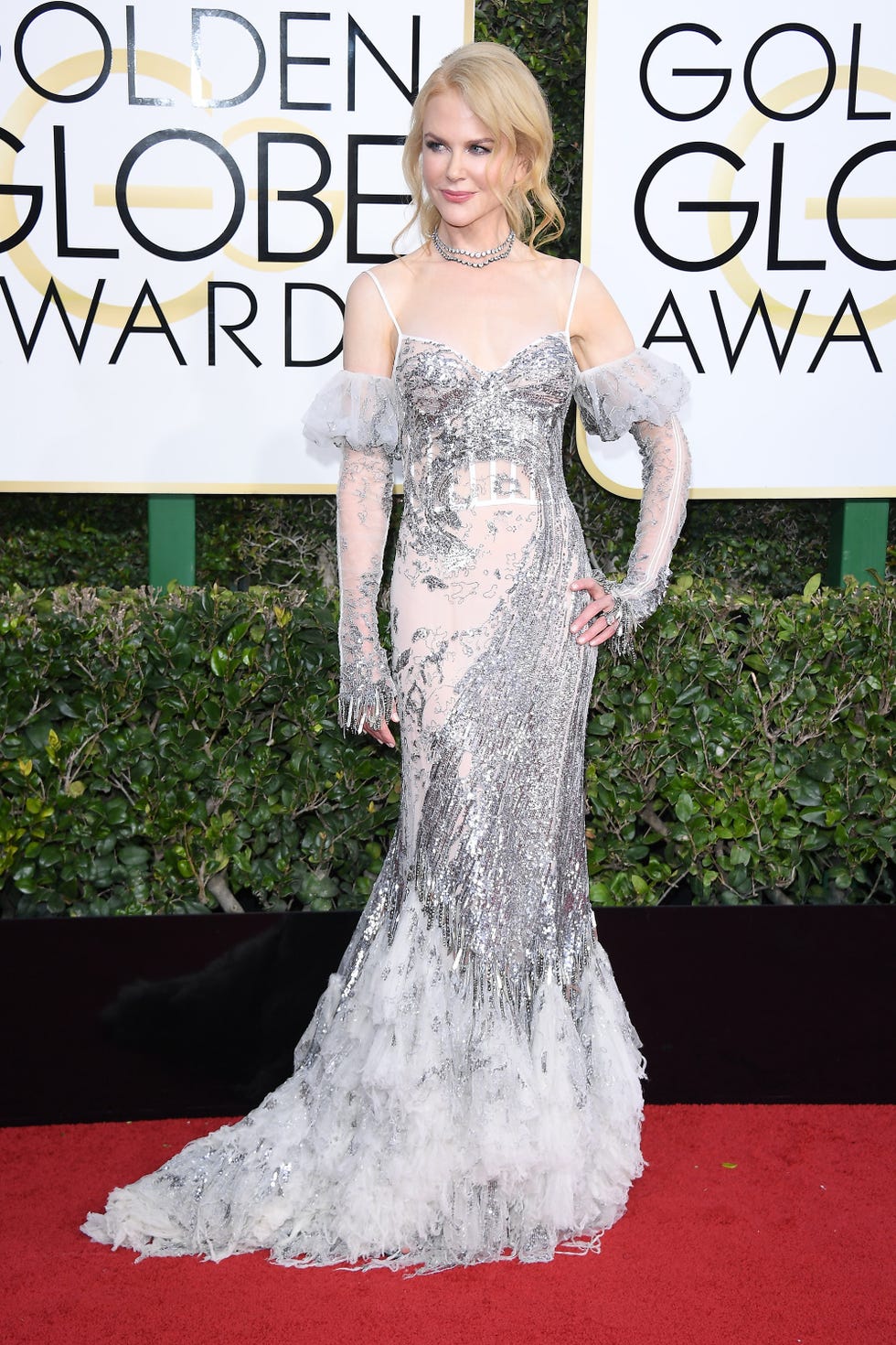 Red carpet, Dress, Gown, Carpet, Clothing, Shoulder, Flooring, Fashion model, Fashion, Hairstyle, Red carpet, Dress, Gown, Carpet, Clothing, Shoulder, Flooring, Fashion model, Fashion, Hairstyle,