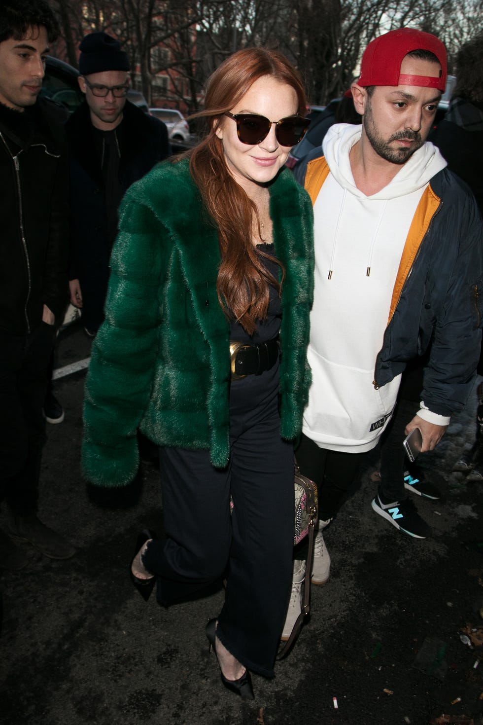 Clothing, Eyewear, Face, Nose, Vision care, Green, Trousers, Jacket, Outerwear, Sunglasses, 
