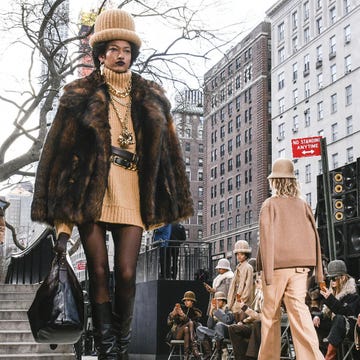Leg, Winter, Coat, Textile, Jacket, Outerwear, Street, Street fashion, Urban area, Fur clothing, 