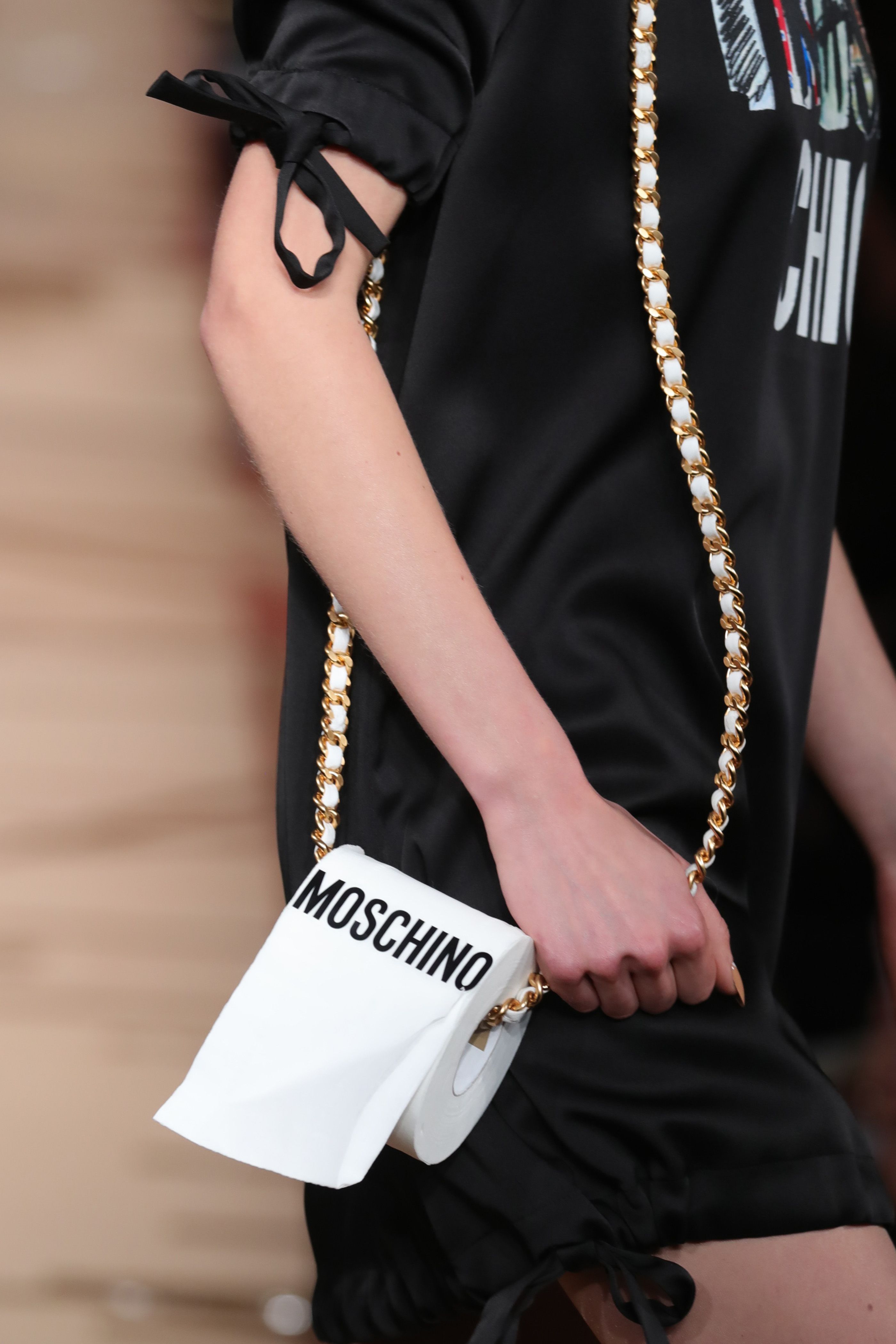 Moschino trash can purse hot sale