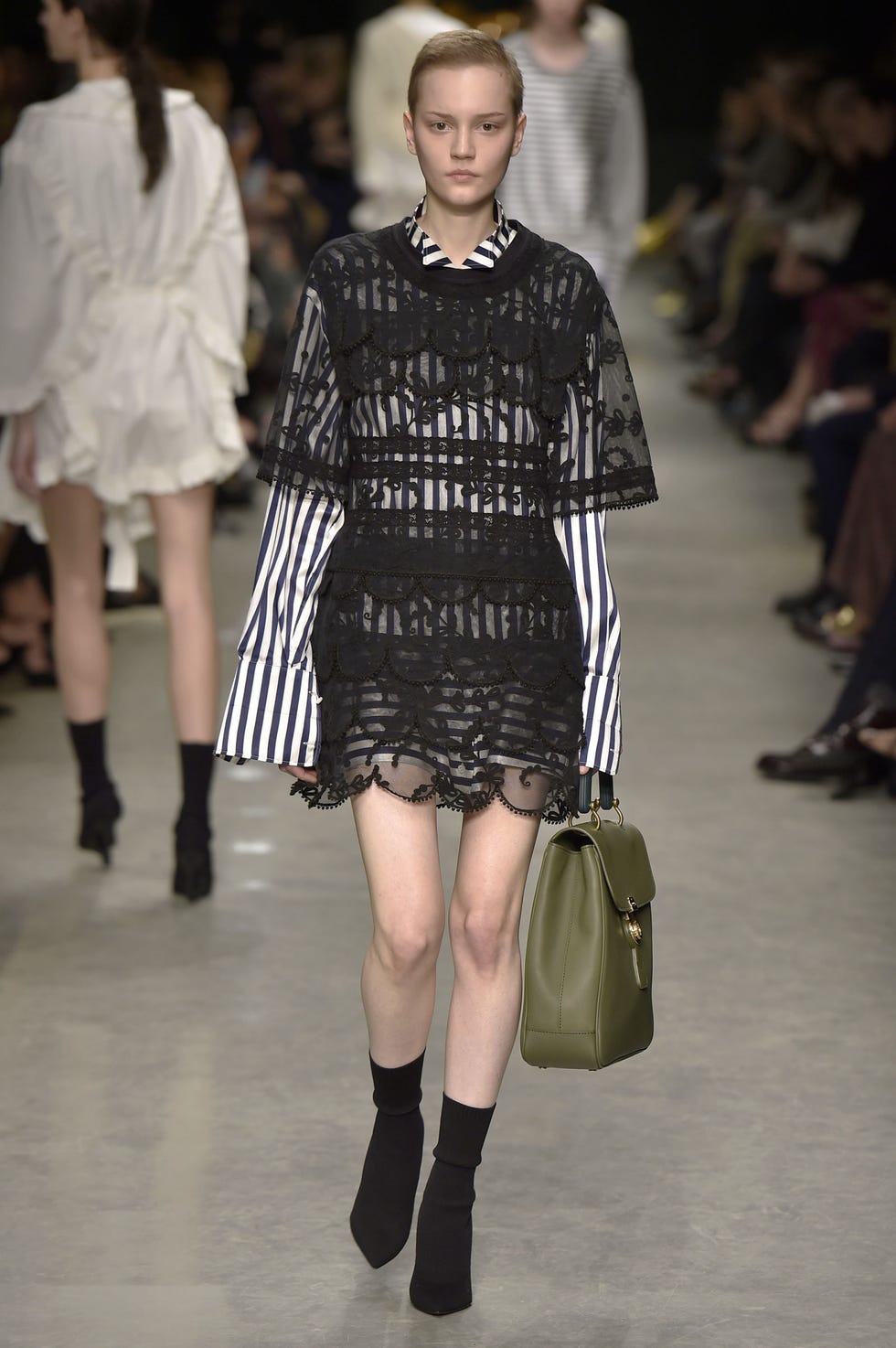 Clothing, Footwear, Human, Leg, Fashion show, Event, Dress, Shoulder, Joint, Outerwear, 