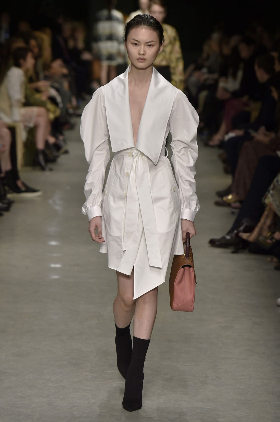 Clothing, Footwear, Leg, Human, Fashion show, Shoulder, Joint, Outerwear, Runway, Fashion model, 