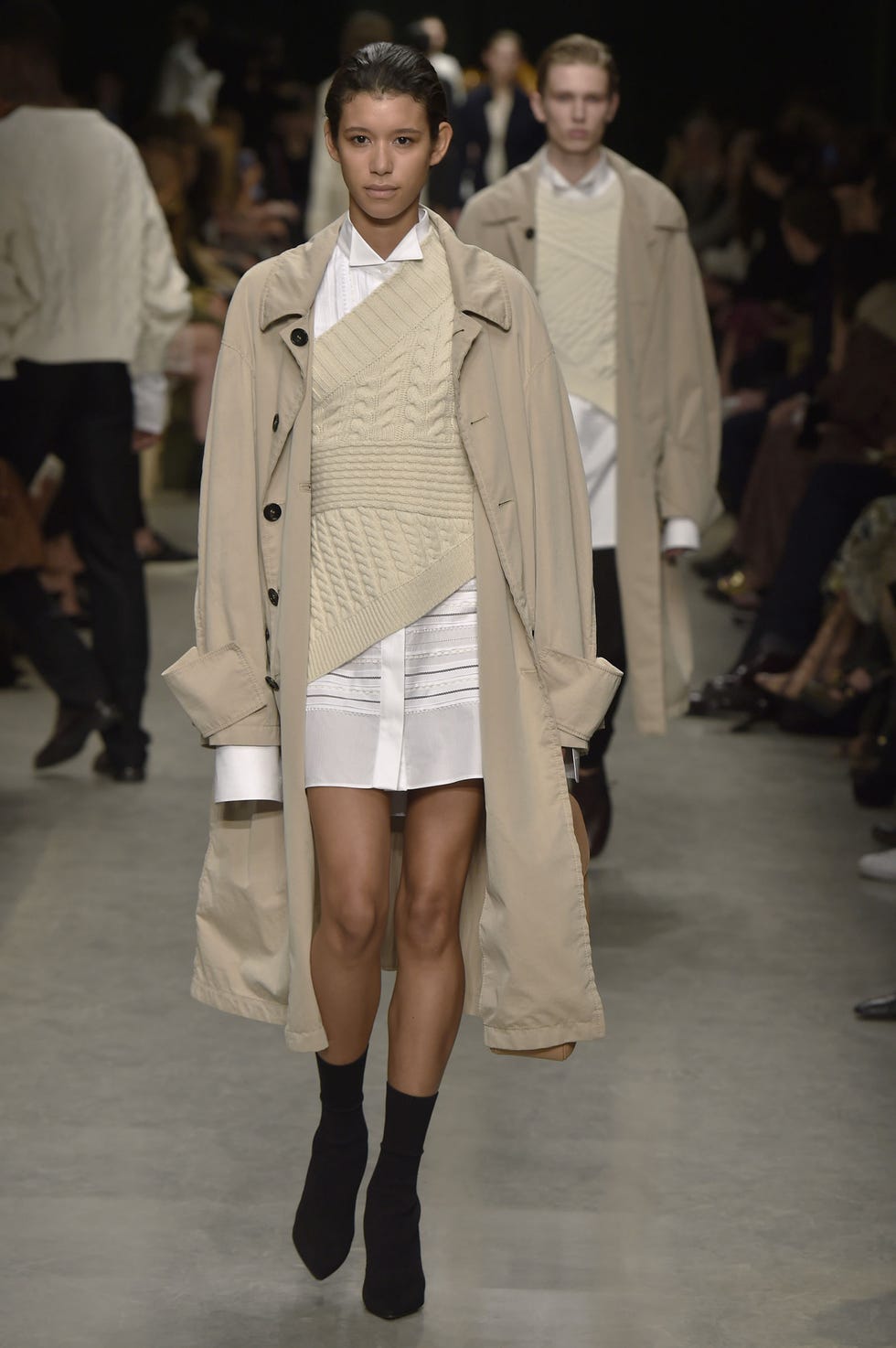 Footwear, Leg, Sleeve, Fashion show, Human body, Runway, Outerwear, Human leg, Fashion model, Coat, 