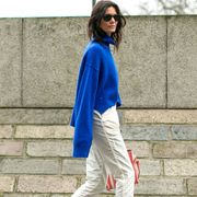 Clothing, Sleeve, Shoulder, Outerwear, Style, Bag, Street fashion, Sunglasses, Electric blue, Fashion, 