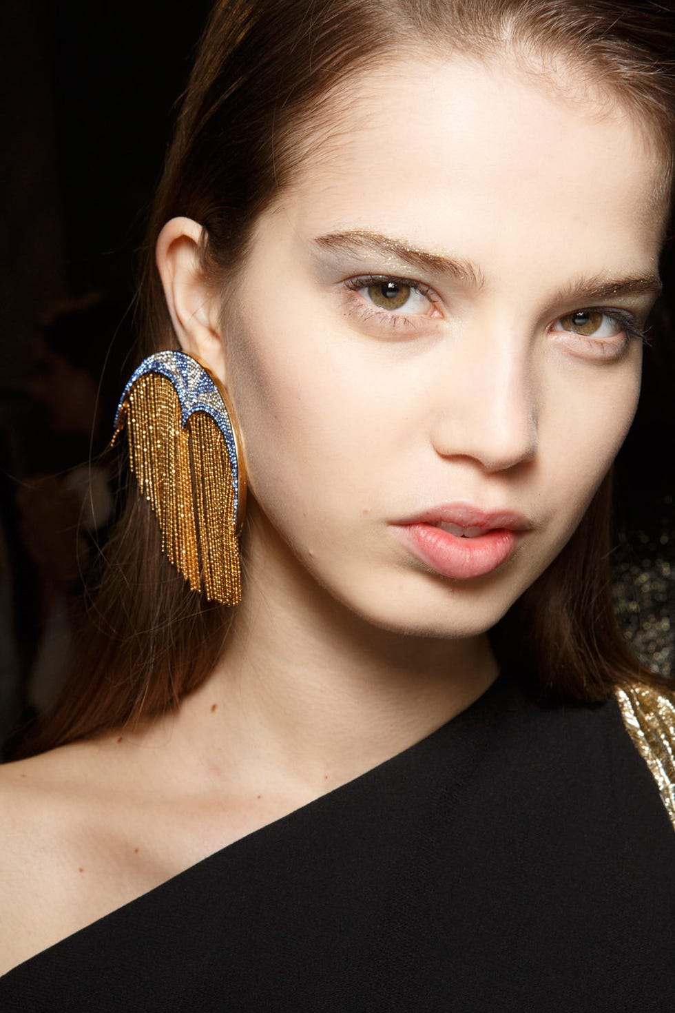 <p>The most delicate take on metallics was at Genny, where the silver shimmer swept up to the brow bones could only be seen in certain light.</p>