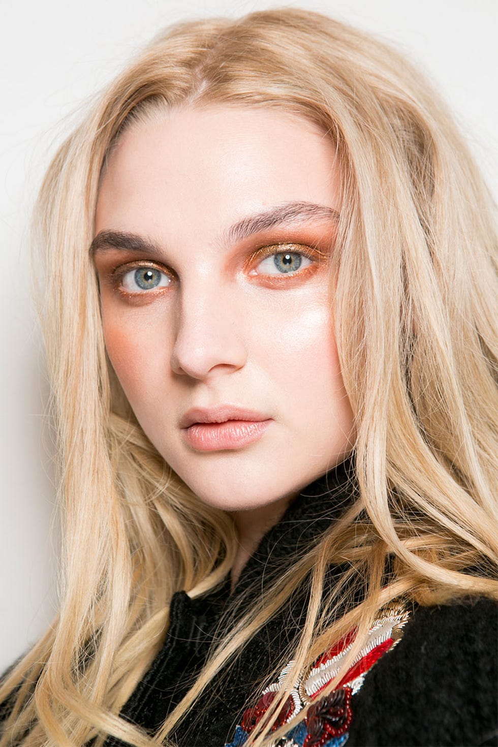 <p>A copper smoky eye backstage at Les Copains.</p>