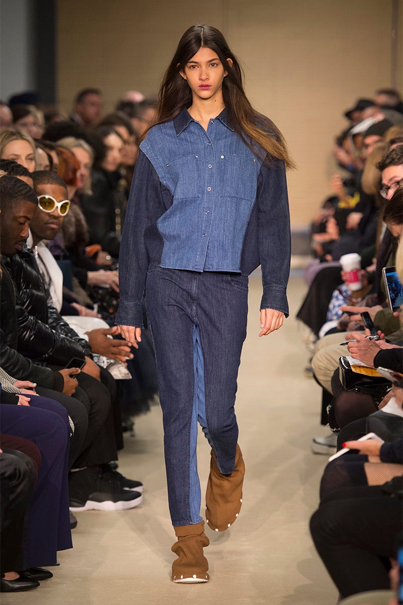 Footwear, Eyewear, Leg, Trousers, Human body, Event, Fashion show, Shirt, Outerwear, Runway, 