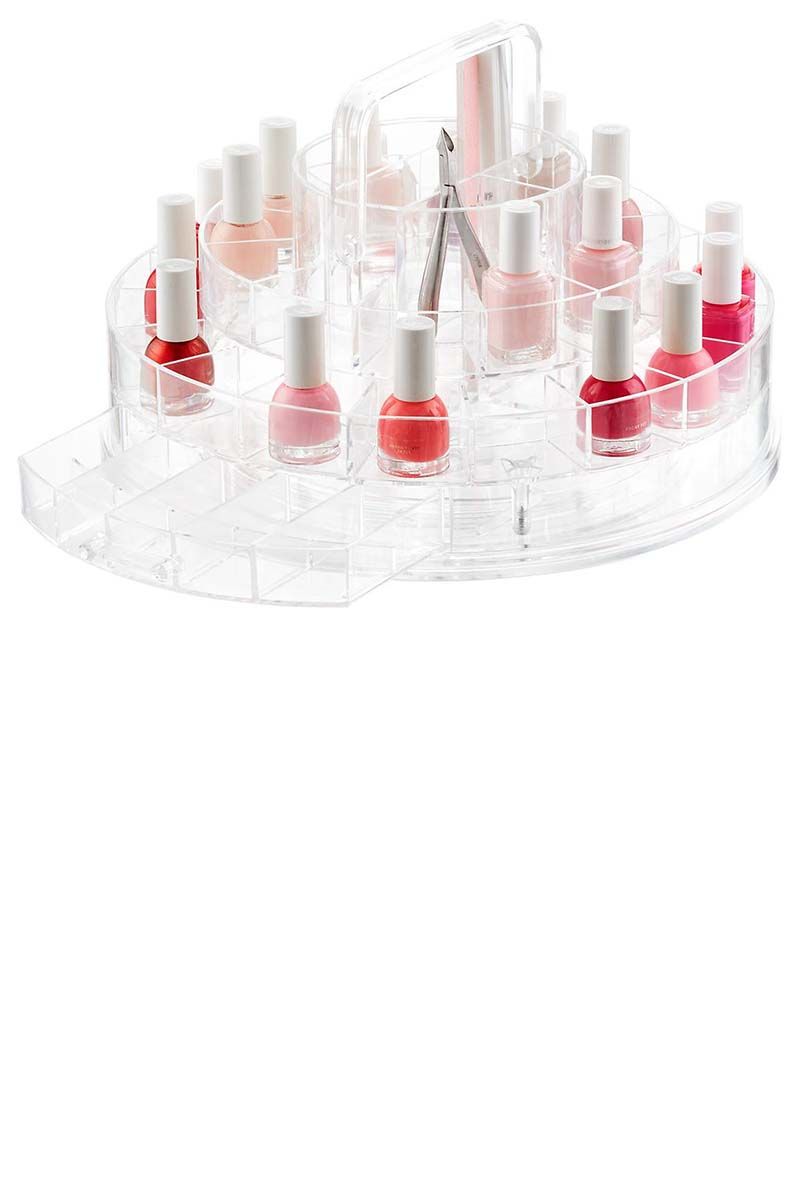 <p>DIY manicurists, rejoice! This cute little caddy neatly displays 30 polishes, plus it's equipped with two drawers and tool compartments for salon-level organization at home. Oh, and did we mention it spins?</p><p><strong data-redactor-tag="strong" data-verified="redactor">The Container Store</strong> Clearly Chic Nail Boutique, $40, <a href="https://www.containerstore.com/s/bath/makeup-organizers/clearly-chic-nail-boutique/12d?productId=11003530" target="_blank" data-tracking-id="recirc-text-link">thecontainerstore.com</a>.</p>