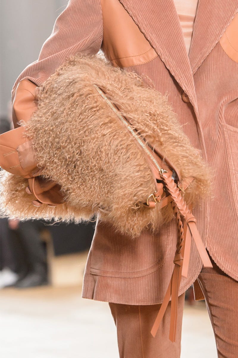 Fur, Clothing, Fashion, Shoulder, Outerwear, Skin, Pink, Fur clothing, Haute couture, Joint, 