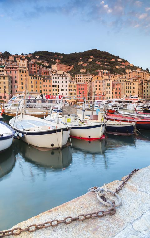 <p>This picturesque fishing village is one of Italy's best kept secrets and a popular summer escape located just <a href="http://www.housebeautiful.com/shopping/furniture/news/a8458/le-refuge-marc-ange/" target="_blank" data-tracking-id="recirc-text-link">two hours from Milan</a>. Fun fact: This brightly-colored town <a href="http://www.cntraveler.com/stories/2014-02-23/camogli-italy-hidden-riviera" target="_blank" data-tracking-id="recirc-text-link">was named after</a> the women who watched the city while their fishermen husbands were away at work.</p>
