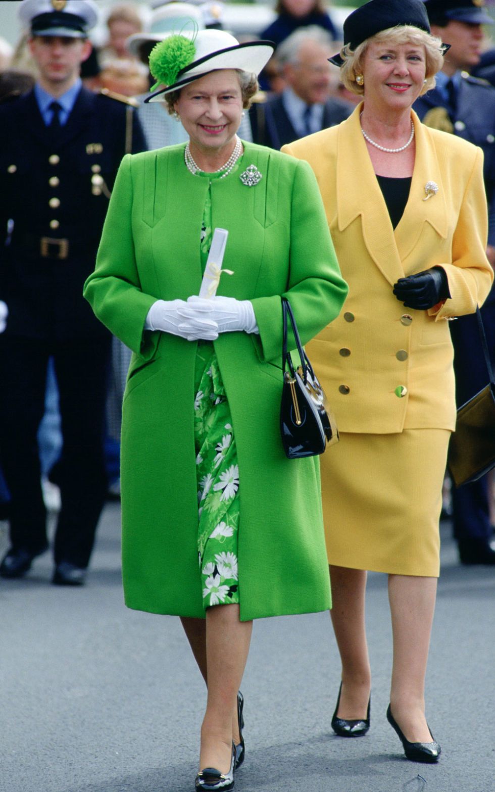 Green, Fashion, Outerwear, Yellow, Street fashion, Uniform, Event, Coat, Overcoat, Suit, 