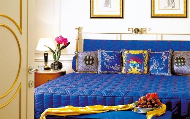 Room, Yellow, Interior design, Textile, Wall, Furniture, Interior design, Purple, Bed, Linens, 