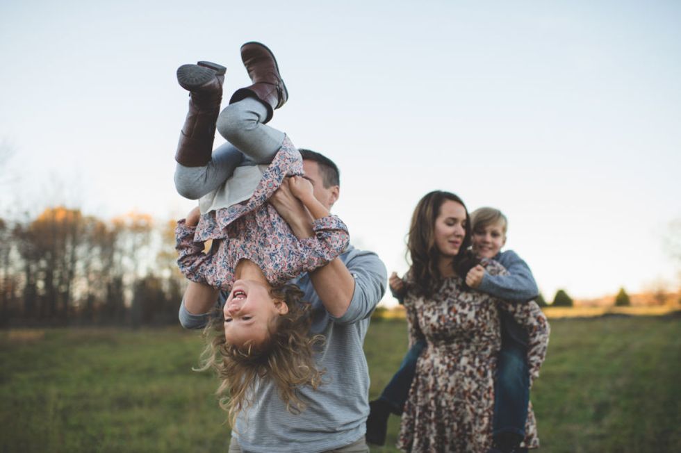 family walking in field