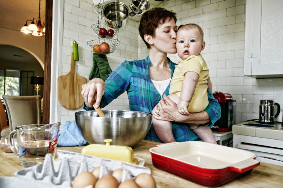 mom cooking with baby
