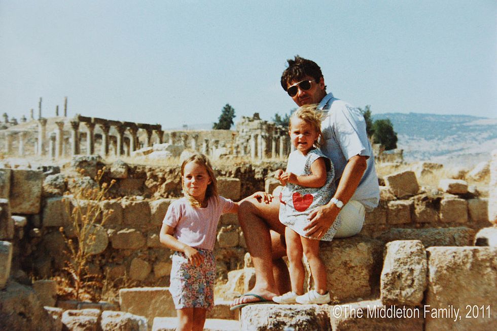 In this Handout Image provided by Clarence House www.officialroyalwedding2011.org, Kate Middleton with sister Pippa and Father Michael in Jerash, Jordan. The Middleton Family moved to Amman, Jordan for two and a half years.