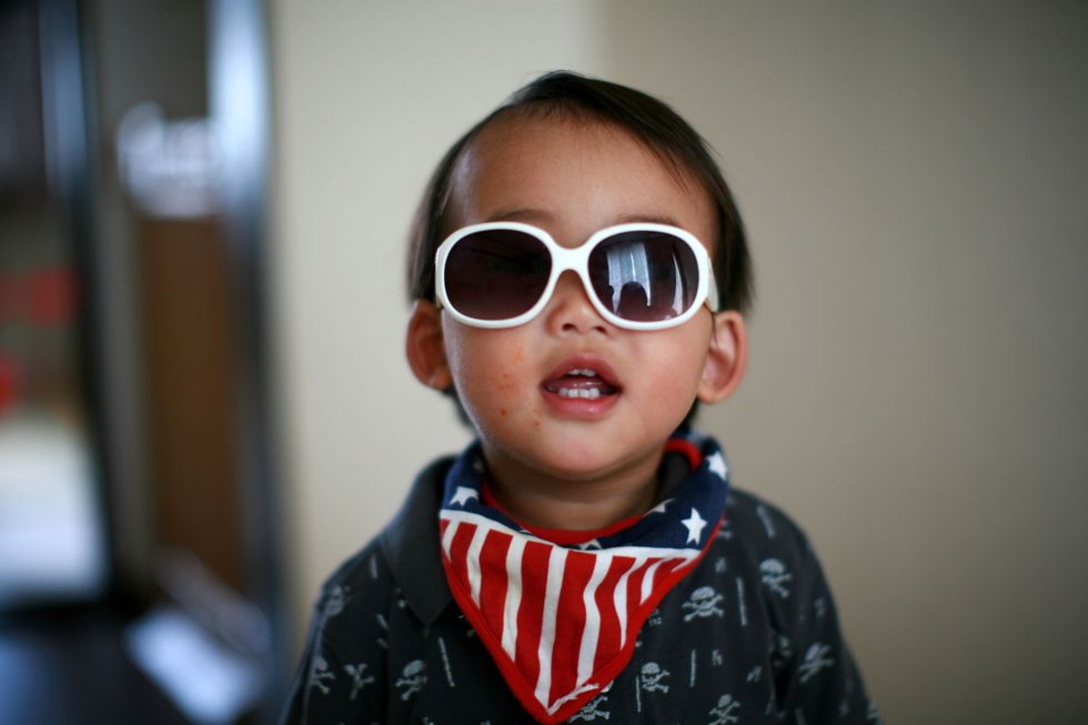 baby hipster wearing sunglasses
