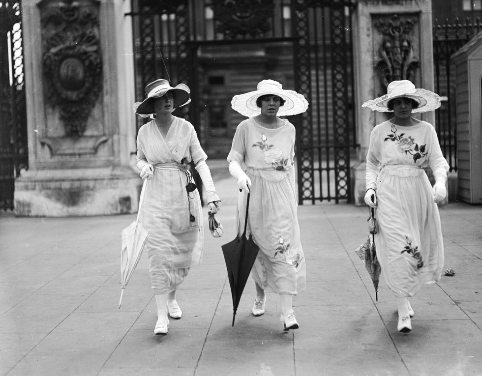 <p>Nobody would be spotted at high tea without an umbrella, a wide-brimmed hat, or white gloves. Preferably, all three.</p>