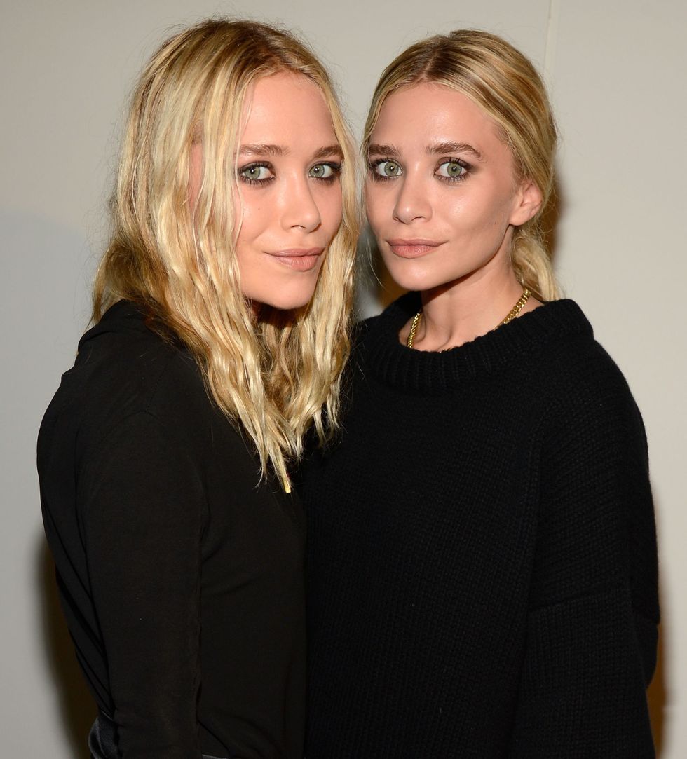 NEW YORK, NY - SEPTEMBER 12:  (L-R) Mary-Kate Olsen and Ashley Olsen attend the Estee Lauder "Modern Muse" Fragrance Launch Party at the Guggenheim Museum on September 12, 2013 in New York City.  (Photo by Kevin Mazur/Getty Images for Estee Lauder)