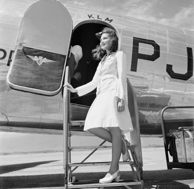 Style, Dress, Monochrome, Sitting, Vintage clothing, Retro style, Black-and-white, Aircraft, Day dress, High heels, 