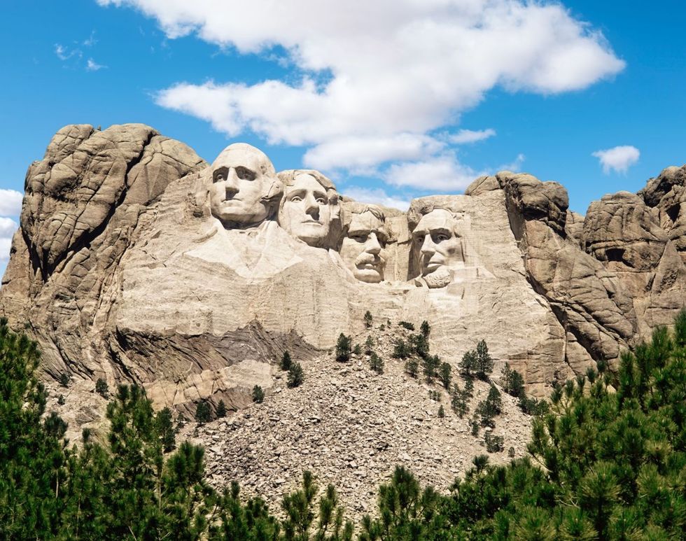 <p> Head to Keystone—the home of Mount Rushmore—and you can say hi to George, Abe, Teddy, and Thomas while taking in some pretty mind-blowing views. In fact, this year marks the 75<sup>th</sup> anniversary of completion! Travel 15 miles to Custer State Park, where you can peruse an art festival (September 29 – October 1) or even watch the annual Buffalo Roundup (September 30)(sure, why not), where cowboys and cowgirls round up and drive the herd of approximately 1,300 buffalo. No reservations are required, but definitely plan in advance—the event draws 14,000 visitors each year. Lastly, be sure to hit up the Wind Cave National Park, where you can get an intimate 4-hour tour and go spelunking through the dark tunnels and caves.</p>