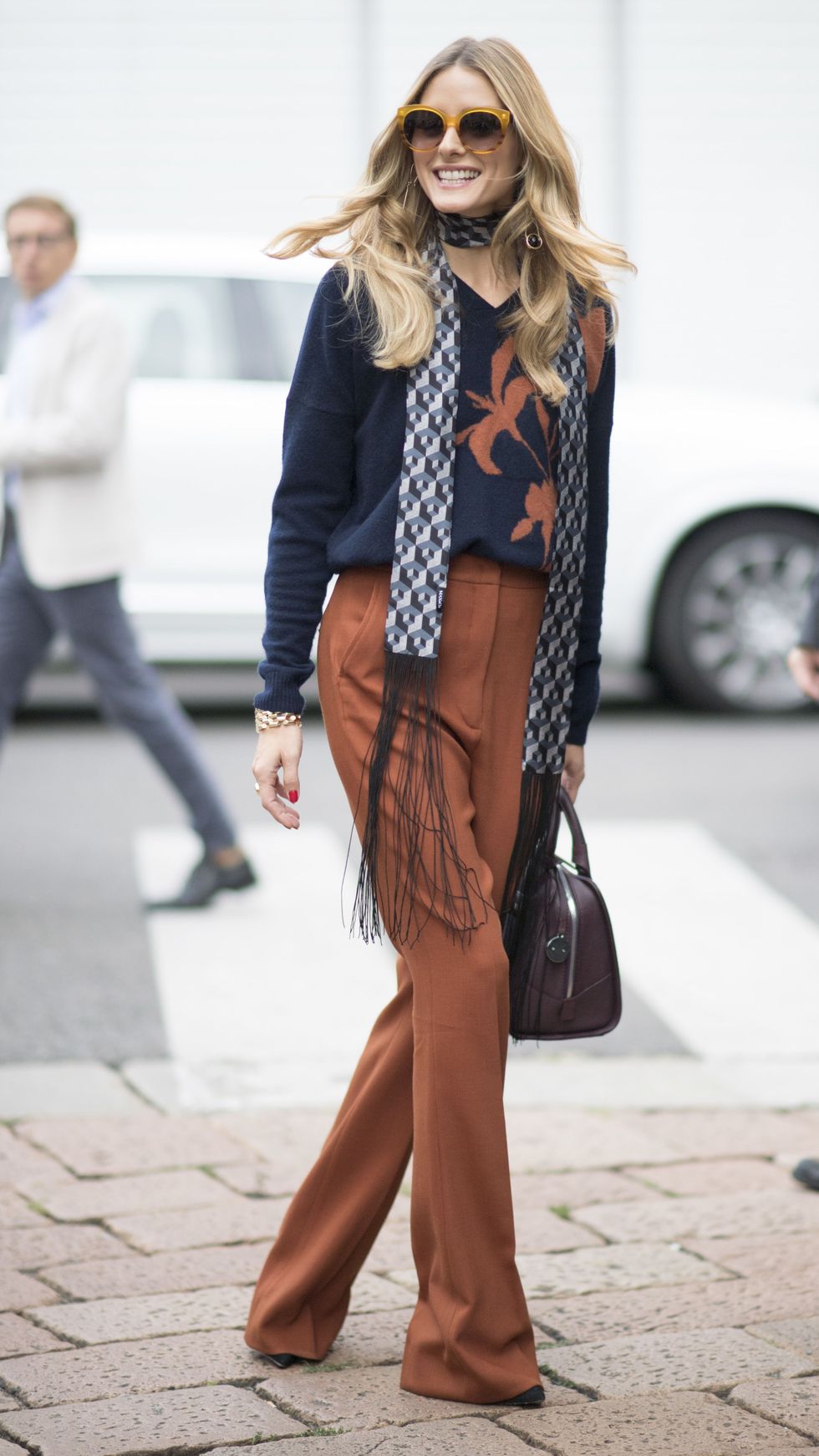 <p>It may not quite be full-blown scarf season yet, but a skinny&nbsp;style helps bridge the gap and gives your look '70s glam vibe.&nbsp;</p>