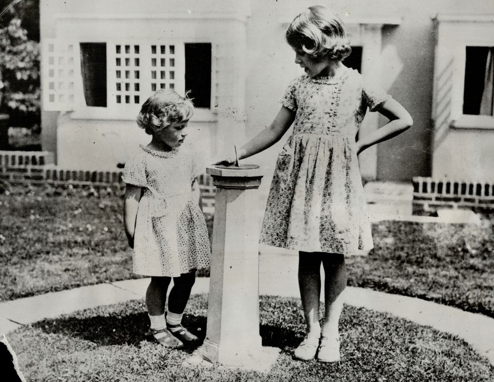 London; England.-Photo Shows Princess Elizabeth (right) and her Sister; Princess Margaret Rose; Daughters of the Duke and Duchess of York; whom rumor has it are being closely guarded in the summer Home in the Highlands of Scotland As a precaution against
