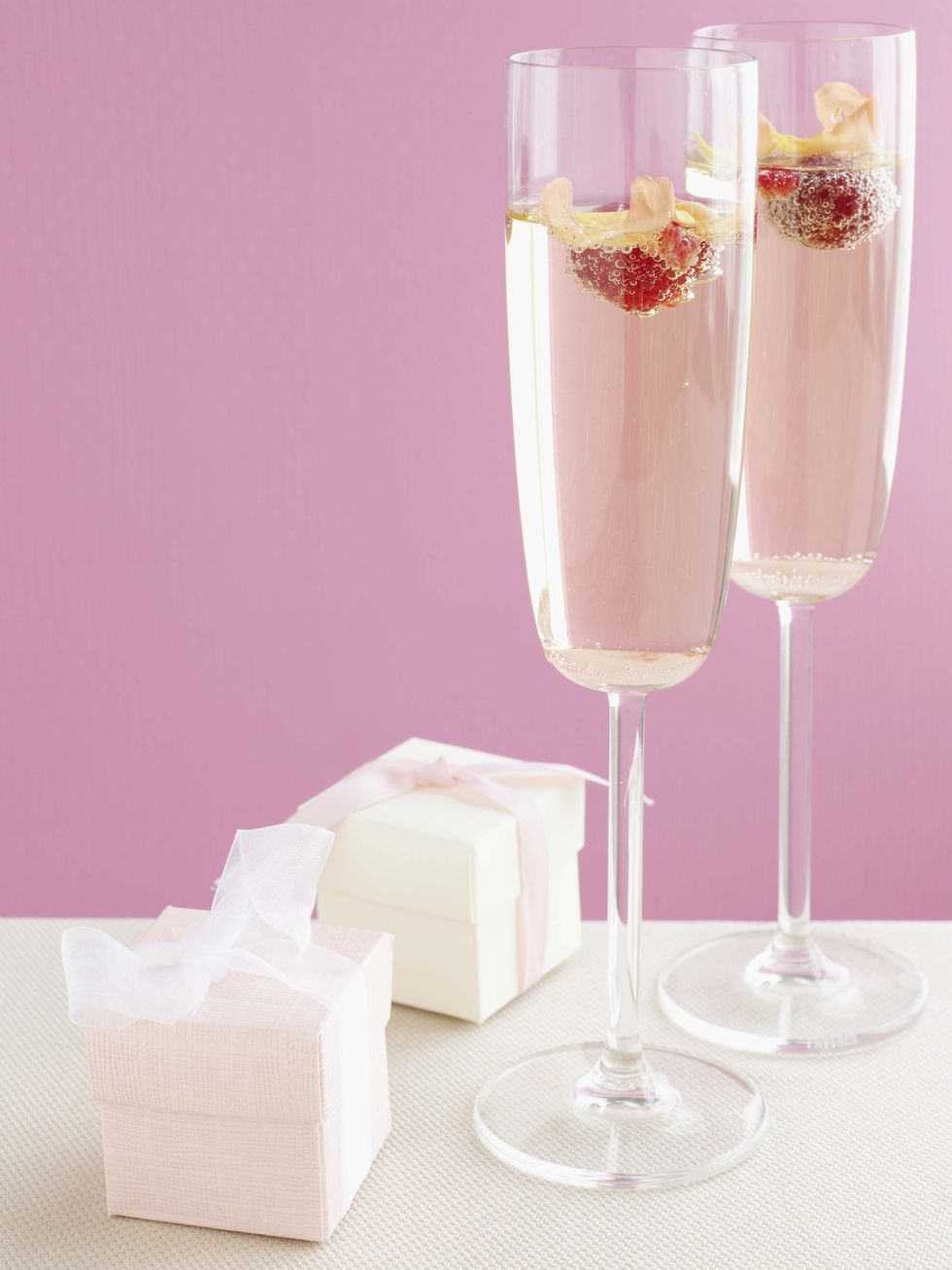 <p>The <a href="http://somethingturquoise.com/2013/12/17/raspberry-champagne-cocktail-recipe/" target="_blank">perfect drink</a> for sipping at special events and weddings. </p><p><strong>Ingredients: </strong></p><p>Dry Sparkling Wine</p><p>Fresh Raspberries</p><p>1 Tblsp. Raspberry Liqueur<strong></strong></p><p><strong>Directions: </strong></p><p>Top off your champagne with a few raspberries and a tablespoon of raspberry liqueur, then serve. </p>