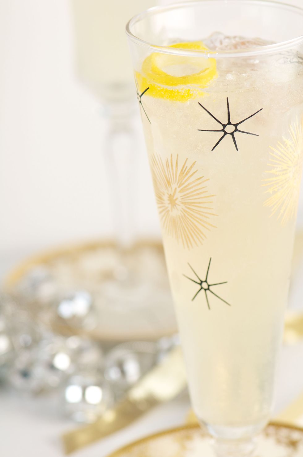 <p>A citrusy summer favorite. </p><p><strong>Ingredients: </strong></p><p>Bottle Santa Margherita Prosecco Superiore</p><p>1 cup Gin</p><p>¼ Freshly Squeezed Lemon Juice</p><p>2 tsp. Sugar</p><p>Lemon Spiral (garnish)</p><p><strong>Directions: </strong></p><p>Fill cocktail shaker with ice, gin, lemon juice, and sugar. Pour into champagne flute. Top with Santa Margherita Prosecco Superiore. Stir and garnish with lemon spiral.<br></p>