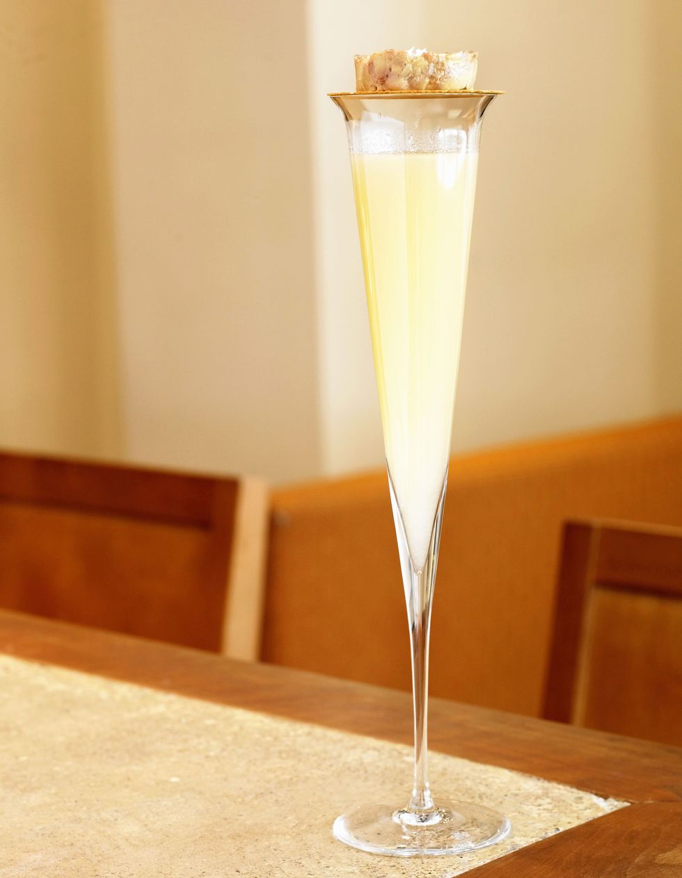 <p><a href="http://dishingupthedirt.com/featured/pear-ginger-sage-champagne-cocktails/" target="_blank">If you fancy</a>. <strong></strong></p><p><strong>Ingredients: </strong></p><p>1 cup Honey</p><p>3 cups Water</p><p>2 Whole Pears, peeled, cored, and diced</p><p>1 Large Chunk of Ginger, peeled and diced</p><p>20 Fresh Sage Leaves, plus additional for garnish</p><p>1 Bottle of Champagne or Sparkling Wine</p><p><strong>Directions: </strong></p><p><span></span>In a saucepan combine the honey and water over medium heat and bring to a light boil. Turn the heat down to low and simmer, stirring occasionally, until the honey has dissolved completely. Add the pears, ginger, and sage leaves. Simmer until the mixture has reduced by 1/3 for about 15-20 minutes, stirring occasionally. Remove from heat and let the mixture steep for an additional 10 minutes. Strain the syrup into a large mason jar. Discard the ginger and sage leaves. To assemble the drinks place a few pieces of the cooked pear into each glass followed by 1-2 tablespoons of the simple syrup. Add the champagne and enjoy.</p>