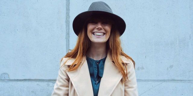 Clothing, Hat, Sleeve, Collar, Outerwear, Coat, Happy, Facial expression, Style, Fashion accessory, 