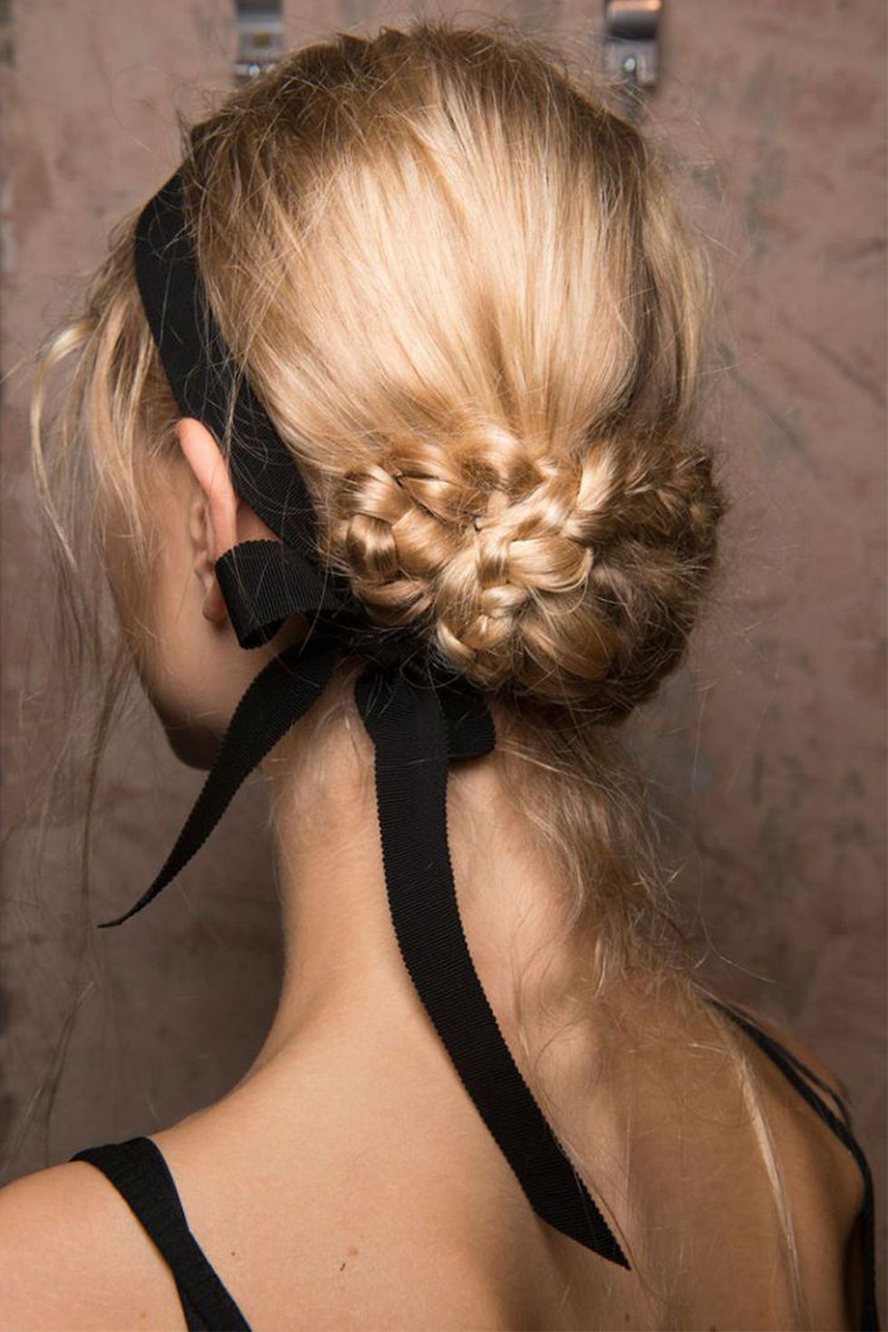 <p>The only thing prettier than the braided bun at Erdem's spring 2017 show was the way the black ribbon was tied like an askew headband. </p>