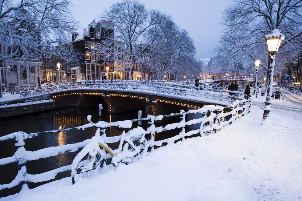 Winter, Freezing, Street light, Snow, Waterway, Bridge, Guard rail, Channel, Light fixture, Canal, 