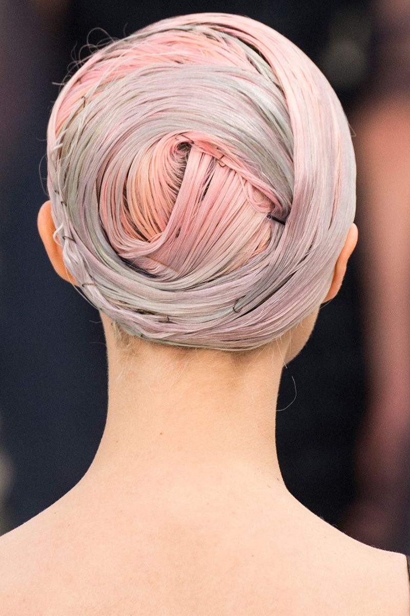 <p>The hair at Chanel was swirled and rolled into sleek hair buns by hairstylist Sam McKnight.</p>