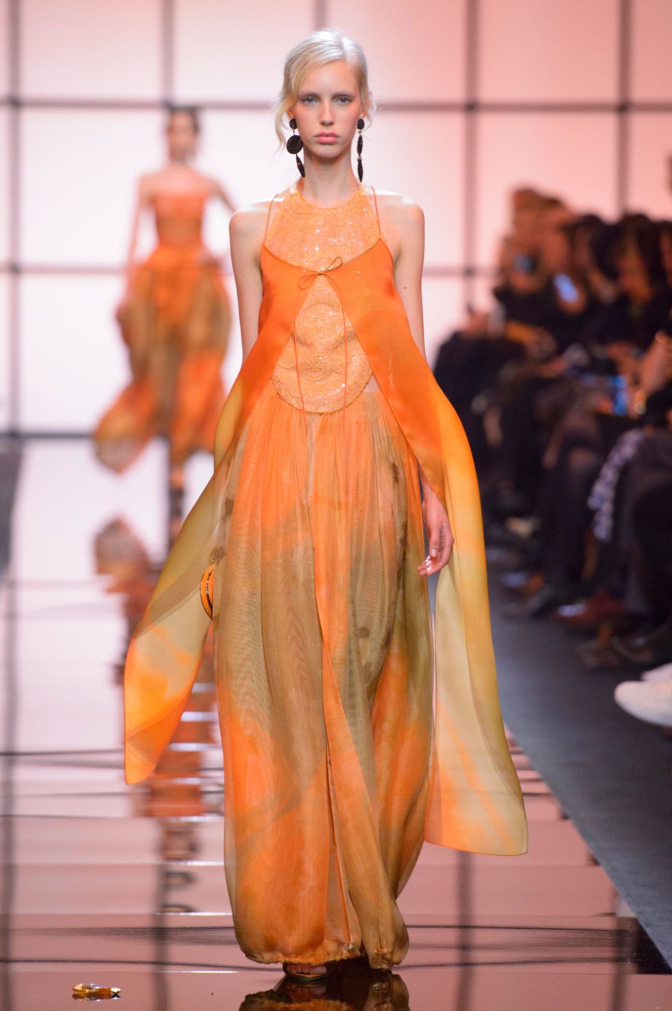 Hairstyle, Fashion show, Shoulder, Runway, Dress, Orange, Style, Amber, Fashion model, Gown, 
