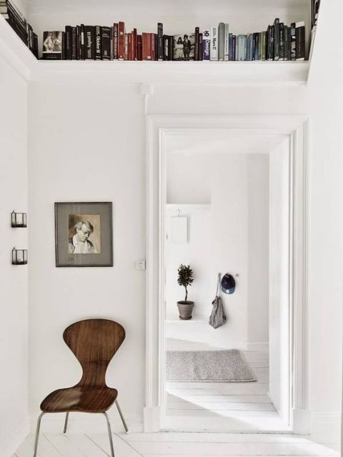 Room, Interior design, Wall, Flowerpot, Shelving, Shelf, Chair, Interior design, Publication, Houseplant, 