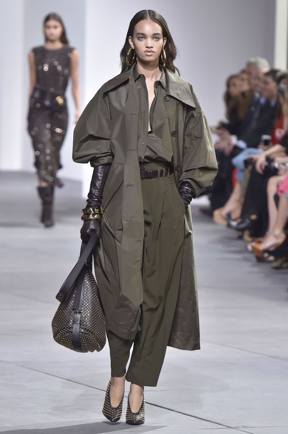 <p>Steadfast and practical, Taurus will naturally gravitate toward khaki, one of spring's favorite fabrics, seen here at Michael Kors. But no pleated slacks for you—instead, branch out with a billowy trench-inspired top *and* pants that could fit you and two friends. And don't forget your <a href="http://www.marieclaire.com/fashion/news/g4077/mega-earrings-spring-17/" target="_blank" data-tracking-id="recirc-text-link">mega earrings</a>. &nbsp;</p>