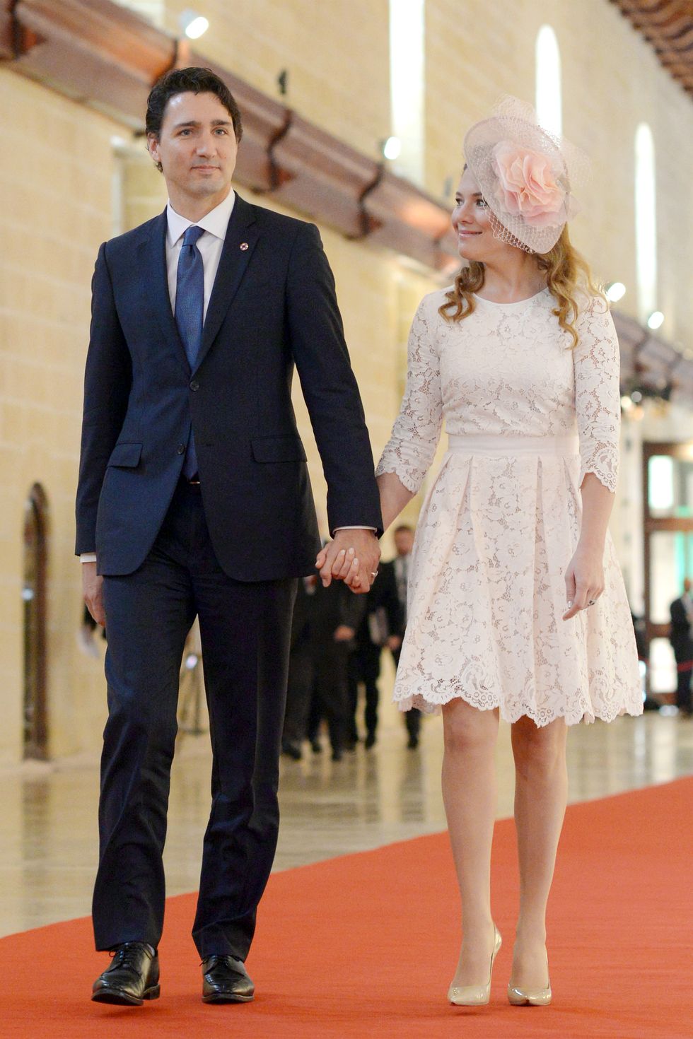 Canadian Prime Minister Justin Trudeau and his wife Sophie Gregoire for the opening ceremony of the Commonwealth Heads of Government Meeting (CHOGM) at the Mediterranean Conference Centre in Valletta on November 27, 2015. The 2015 Commonwealth Summit kicks off today to a grand opening ceremony with Queen Elizabeth II, followed by intense working sessions where world leaders will grapple with climate change. As the clock ticks to a UN climate conference in Paris starting Monday, leaders including France's Francois Hollande, Britain's David Cameron and the UN's Ban Ki-moon will try to open the door to a landmark accord for taming greenhouse gases.    AFP PHOTO / MATTHEW MIRABELLI  --- MALTA OUT / AFP / Matthew Mirabelli        (Photo credit should read MATTHEW MIRABELLI/AFP/Getty Images)