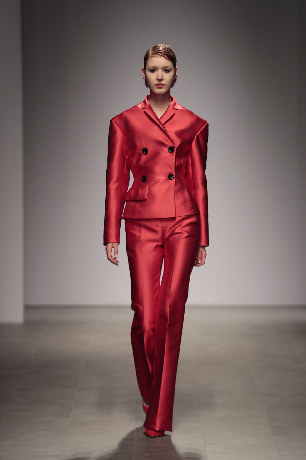 Fashion model, Fashion, Clothing, Suit, Runway, Red, Fashion show, Formal wear, Pantsuit, Haute couture, 