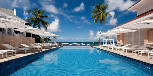 Swimming pool, Resort, Property, Sky, Building, Vacation, Leisure, Architecture, Real estate, Hotel, 